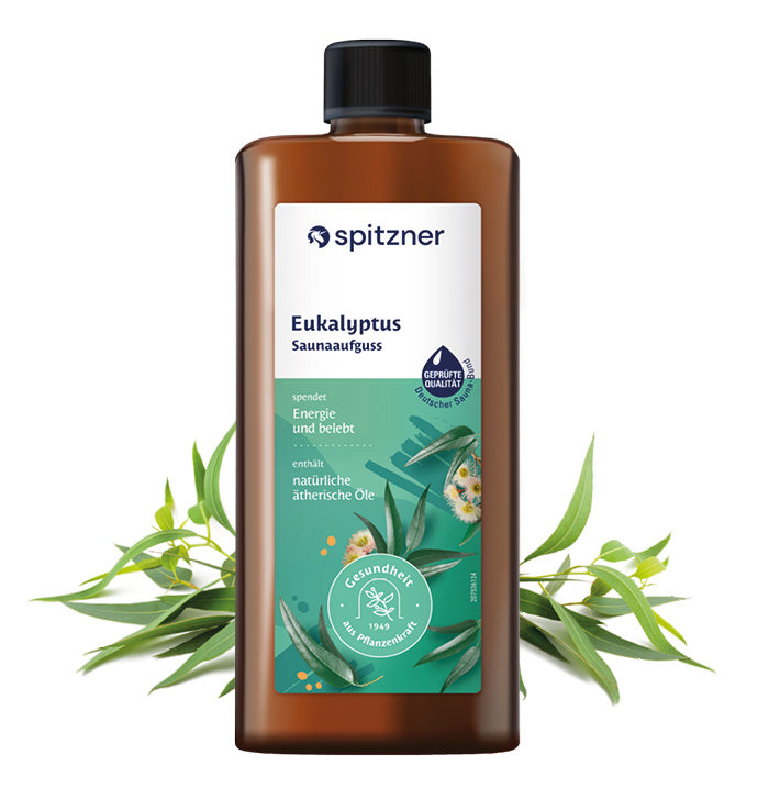 Braune Literflasche Spitzner Saunaaufguss Eukalyptus mit Eukalyptuszweigen vor weißem Hintergrund